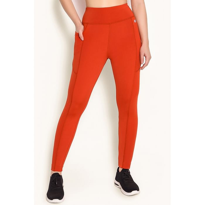 

Clovia High-Rise Active Tights in Orange with Side Pocket - AB5200P16