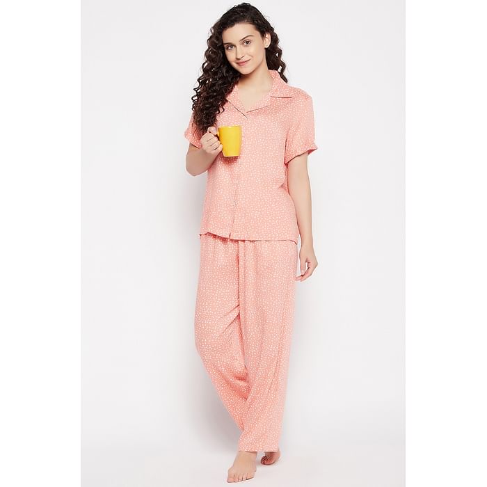 Clovia Pretty Florals Button Down Shirt & Pyjama in Peach Colour - Rayon - LS0385D34
Clovia Pretty Florals Button Down Shirt & Pyjama in Peach Colour - Rayon - LS0385D34
