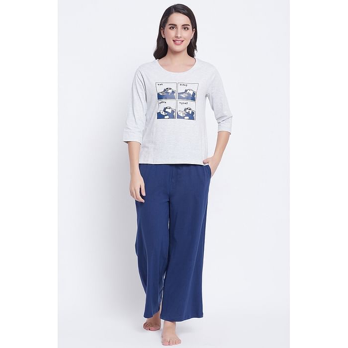 Clovia Text & Graphic Print Top & Solid Flared Pyjama Set in Light Grey - 100% Cotton - LS0546P01
Clovia Text & Graphic Print Top & Solid Flared Pyjama Set in Light Grey - 100% Cotton - LS0546P01