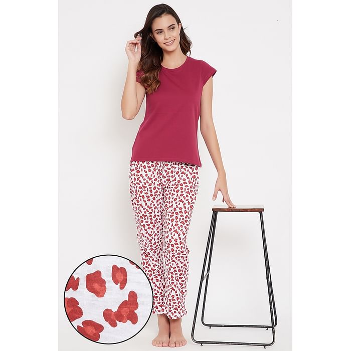 Clovia Chic Basic Top in Maroon & Animal Print Pyjama in White - Cotton Rich - LSC142P09
Clovia Chic Basic Top in Maroon & Animal Print Pyjama in White - Cotton Rich - LSC142P09