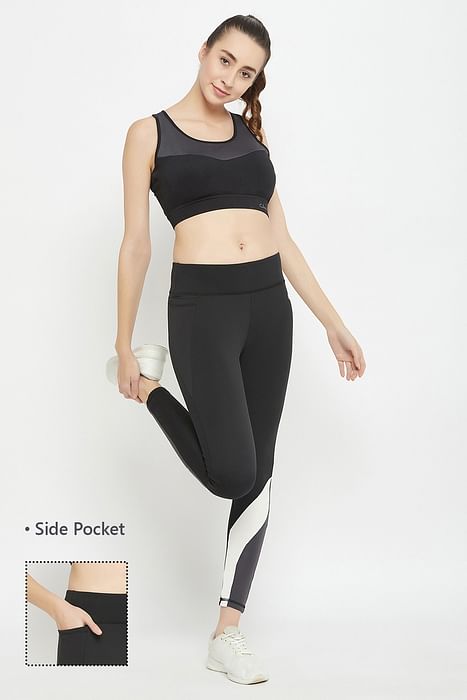 Clovia Medium Impact Padded Colourblocked Racerback Sports Bra & High Rise Active Tights in Black with Side Pocket - ASC048P13
Clovia Medium Impact Padded Colourblocked Racerback Sports Bra & High Rise Active Tights in Black with Side Pocket - ASC048P13