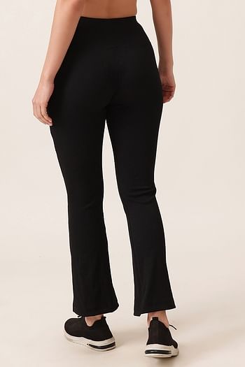Back listing image for Comfort Fit High-Waist Ribbed Flared Yoga Pants in Black with Side Pockets
