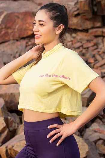 Back listing image for Comfort Fit Text Print Turtleneck Active Crop Top in Yellow	