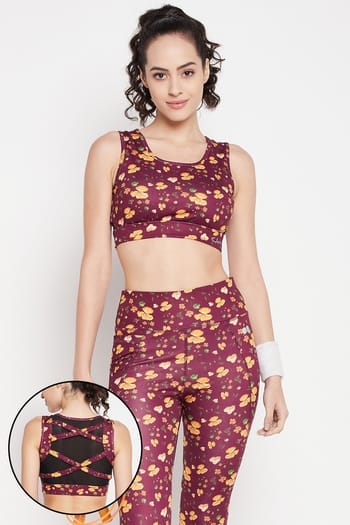 Clovia Medium Impact Padded Floral Print Sports Bra in Plum Colour