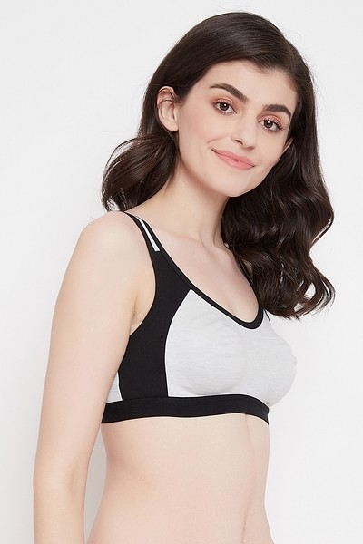Buy Medium Impact Padded Non-Wired Abstract Print Racerback Sports Bra in  White Online India, Best Prices, COD - Clovia - BR2054P03