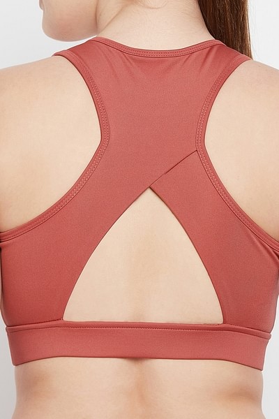 Buy Medium Impact Padded Racerback Sports Bra in Orange Online India, Best  Prices, COD - Clovia - BRS032R16