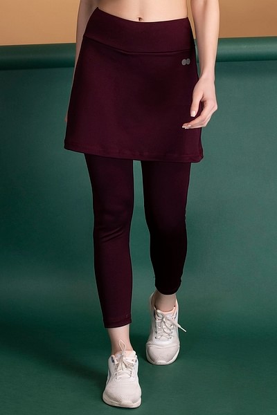 https://image.clovia.com/media/clovia-images/images/400x600/clovia-picture-snug-fit-high-rise-active-skirt-with-attached-tights-in-plum-colour-384632.jpg?q=90