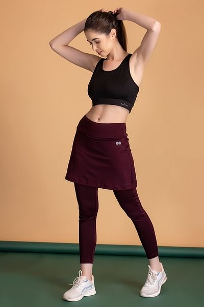 clovia picture snug fit high rise active skirt with attached tights in plum colour 869945