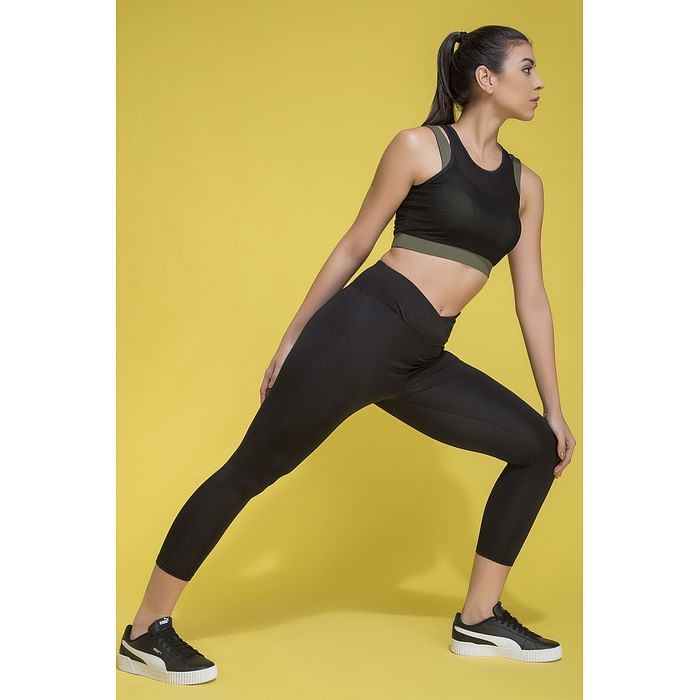 

Clovia Medium Impact Padded Sports Bra & Ankle-Length Tights in Black - ASC047P13
