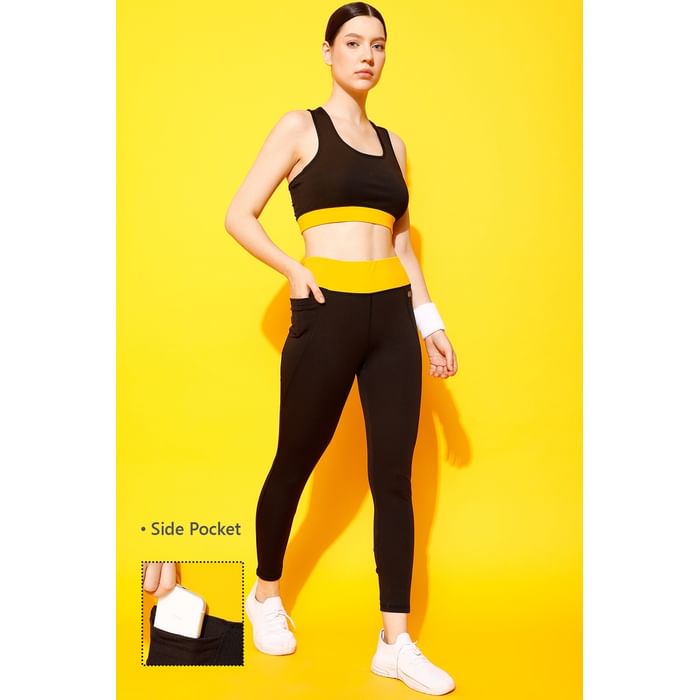 

Clovia Medium Impact Padded Sports Bra & High Rise Active Tights with Side Pocket in Black - ASC084I13