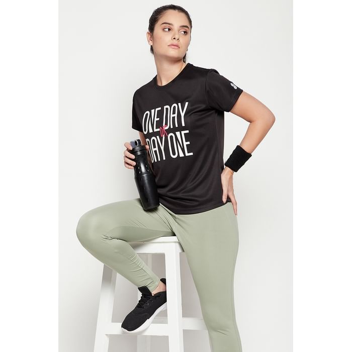 

Clovia Comfort-Fit Text Print Active T-shirt in Black - AT0160A13