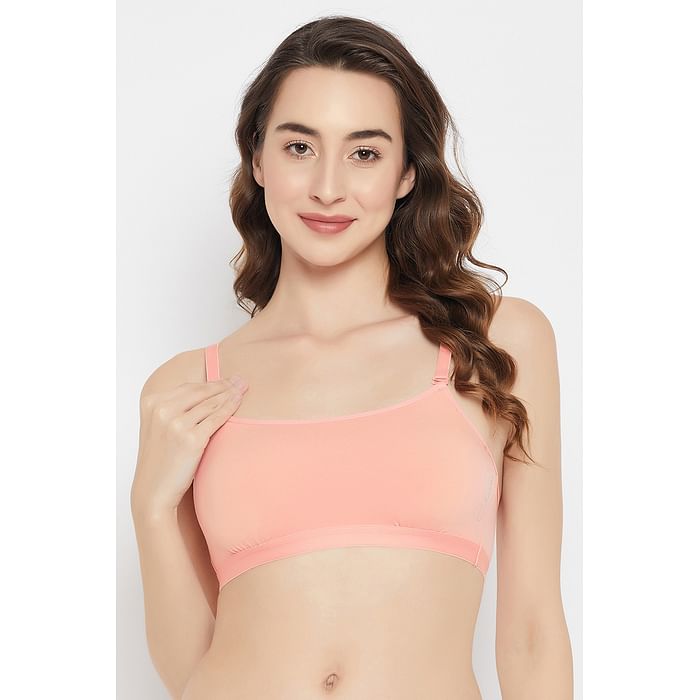 

Clovia Padded Non-Wired Full Cup Beginners Multiway T-shirt Bra in Peach Colour with Removable Cups - Cotton - BB0050A34