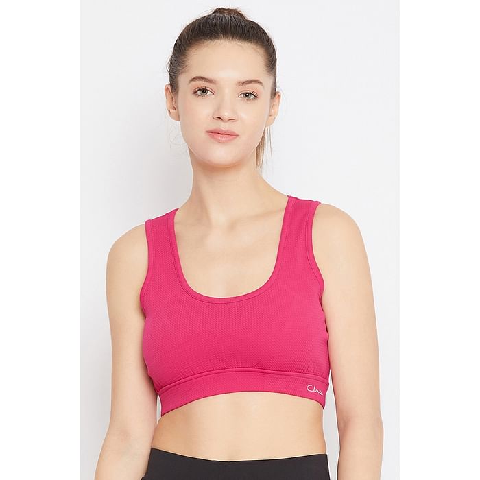 

Clovia Medium Impact Padded Non-Wired Sports Bra with Cutout Back in Dark Pink - BR2056P14