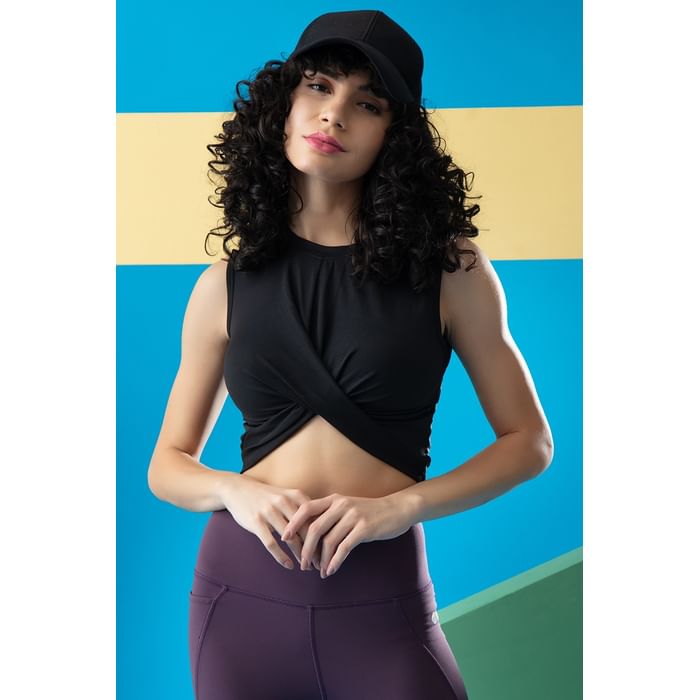 

Clovia Comfort-Fit Front Knot Active Crop Top in Black - AT0177P13