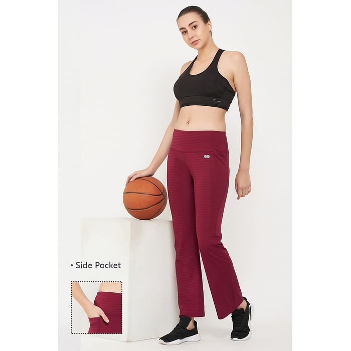 

Clovia High Rise Flared Yoga Pants in Maroon with Side Pocket - AB0090P15, Purple