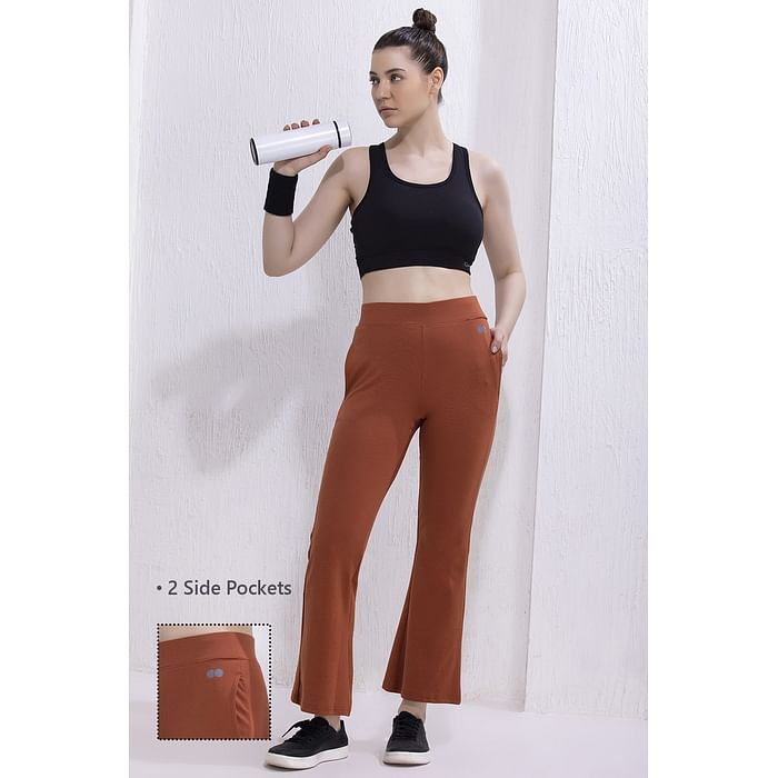 

Clovia Comfort Fit High-Rise Flared Yoga Pants in Orange with Side Pockets - AB0114P16