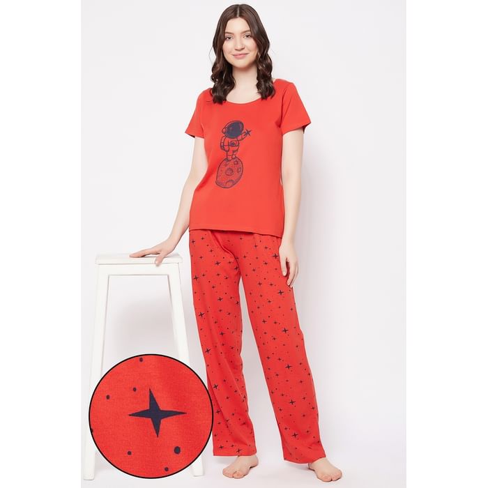 

Clovia Astronaut Print Top & Star Print Pyjama Set in Red - 100% Cotton - LS0413F04