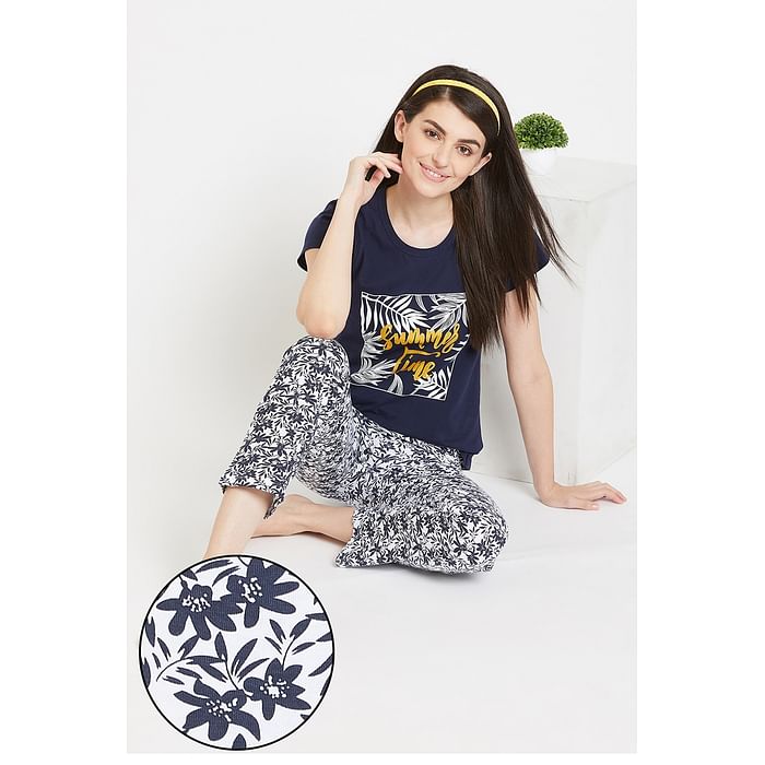 

Clovia Floral Frenzy Top & Pyjama Set in Navy Blue- 100% Cotton - LS0507P08