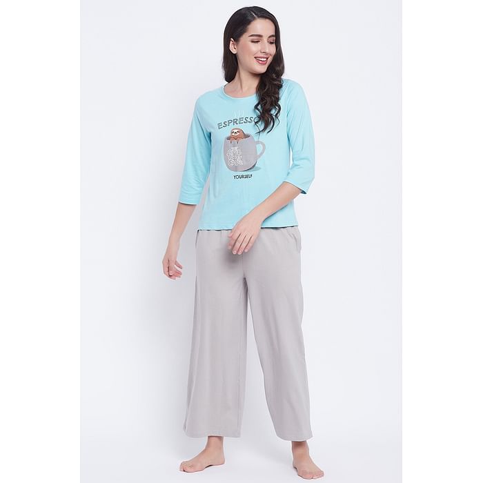 

Clovia Text & Graphic Print Top & Solid Flared Pyjama Set in Sky Blue - 100% Cotton - LS0546A03, Light blue