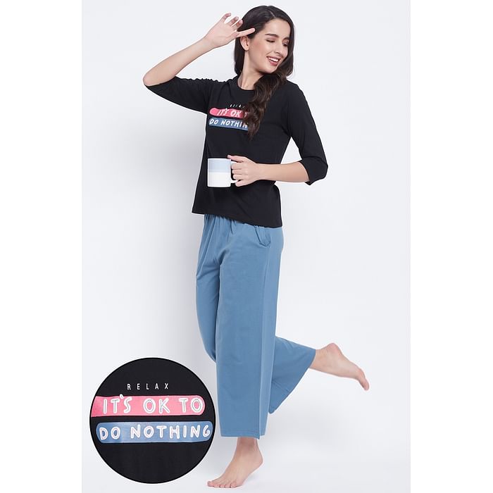 

Clovia Text Print Top & Solid Flared Pyjama Set in Black - 100% Cotton - LS0546D13
