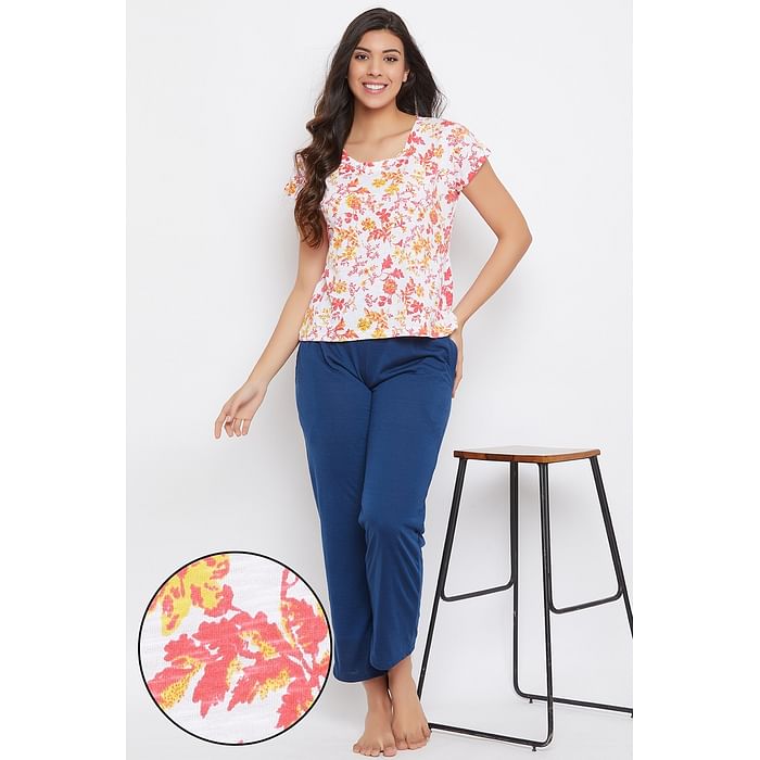 

Clovia Pretty Florals Top & Solid Pyjama in White & Navy - Cotton Rich - LSC132D18