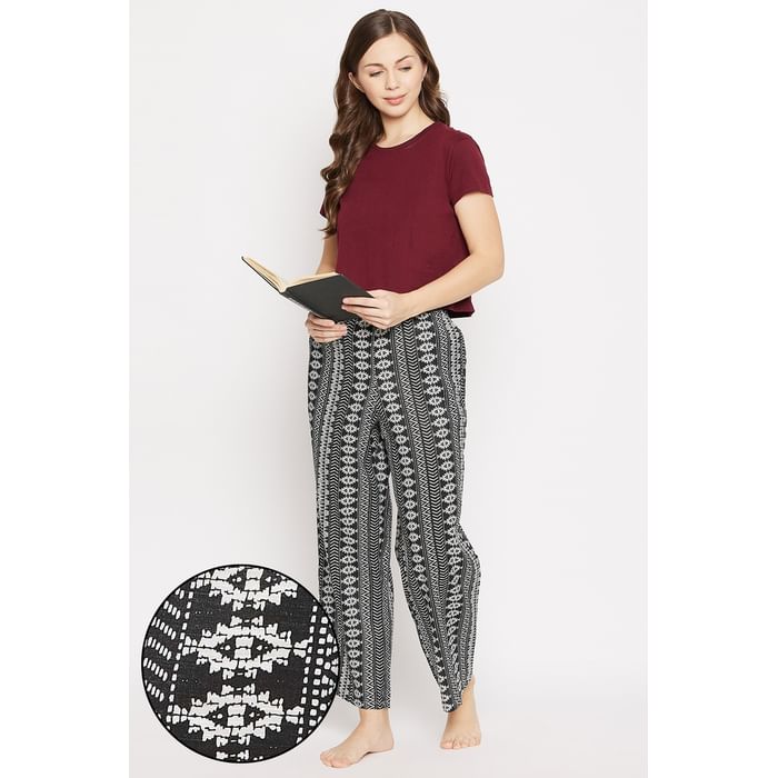 

Clovia Chic Basic Crop Sleep T-shirt in Maroon & Print Me Pretty Flared Pyjama in White - LSC191D18