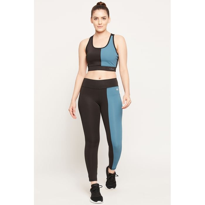 

Clovia Medium Impact Padded Colourblock Sports Bra & Snug Fit Ankle-Length Colourblock Tights in Black - ASC053A13