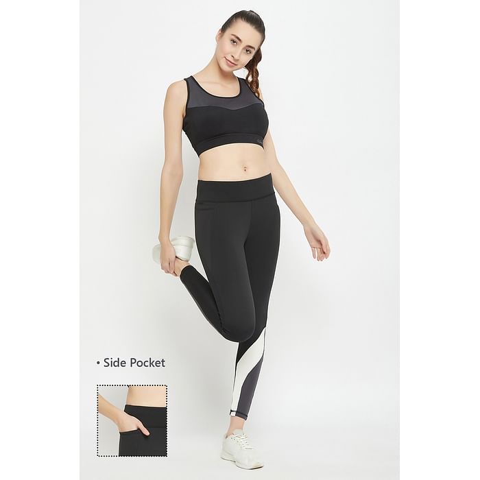 

Clovia Medium Impact Padded Colourblocked Racerback Sports Bra & High Rise Active Tights in Black with Side Pocket - ASC048P13