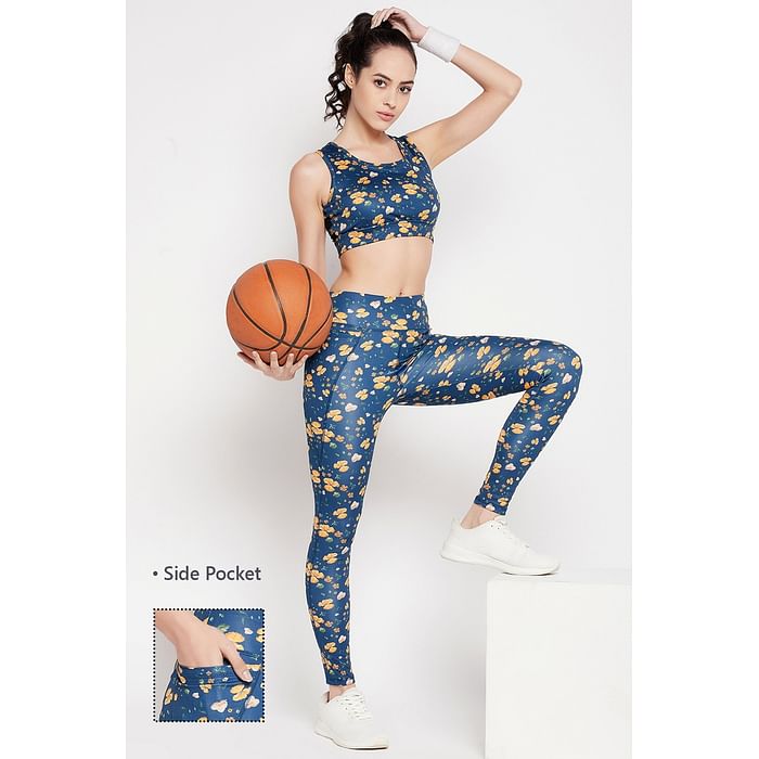 

Clovia Medium Impact Padded Floral Print Sports Bra & Snug Fit High-Rise Floral Print Tights in Navy - ASC042R08