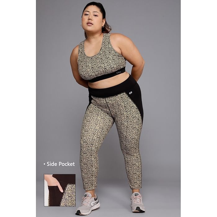 

Clovia Medium Impact Padded Leopard Print Sports Bra & High Rise Active Tights with Side Pocket in Brown - ASC041P06