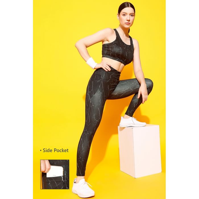 

Clovia Medium Impact Padded Marble Print Sports Bra & Snug Fit High-Rise Active Tights in Dark Grey with Side Pocket - ASC056D05