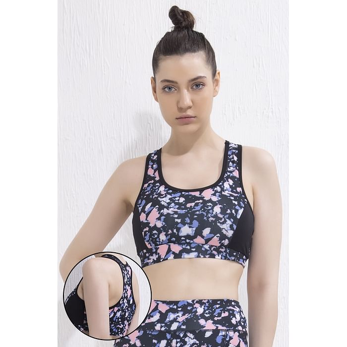 

Clovia Medium Impact Padded Marble Print Racerback Sports Bra in Navy Blue - BRS049P08