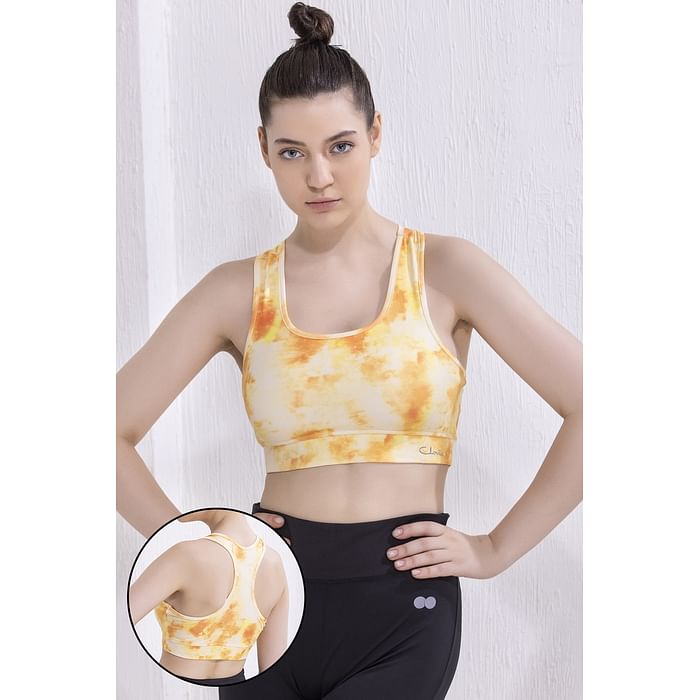 

Clovia Medium Impact Padded Non-Wired Tie-Dye Sports Bra in Orange Colour with Removable Cups - BR2084A16