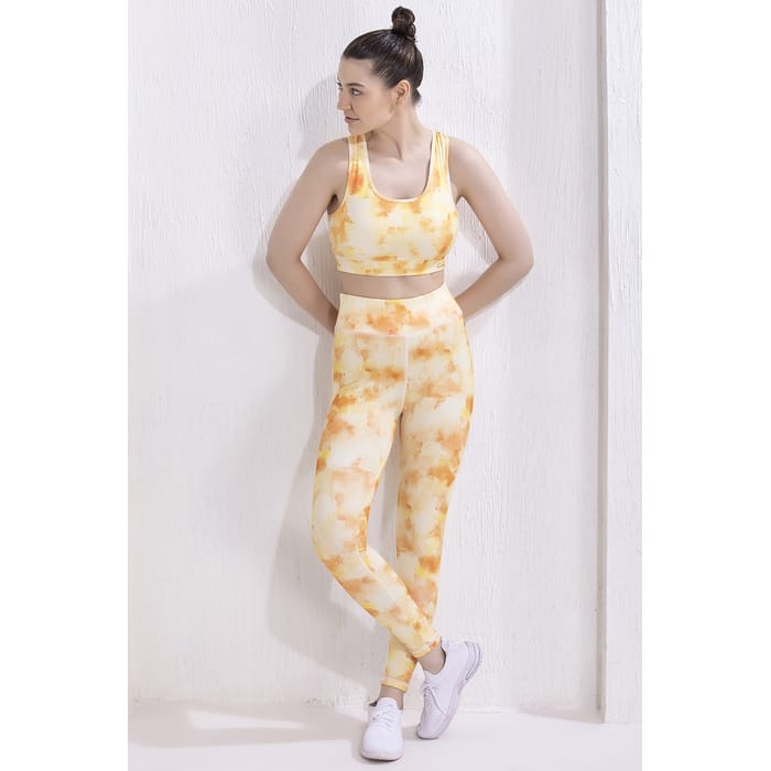 

Clovia Medium Impact Padded Non-Wired Tie-Dye Sports Bra & Snug Fit Active Ankle-Length Tights in Orange - ASC042A16