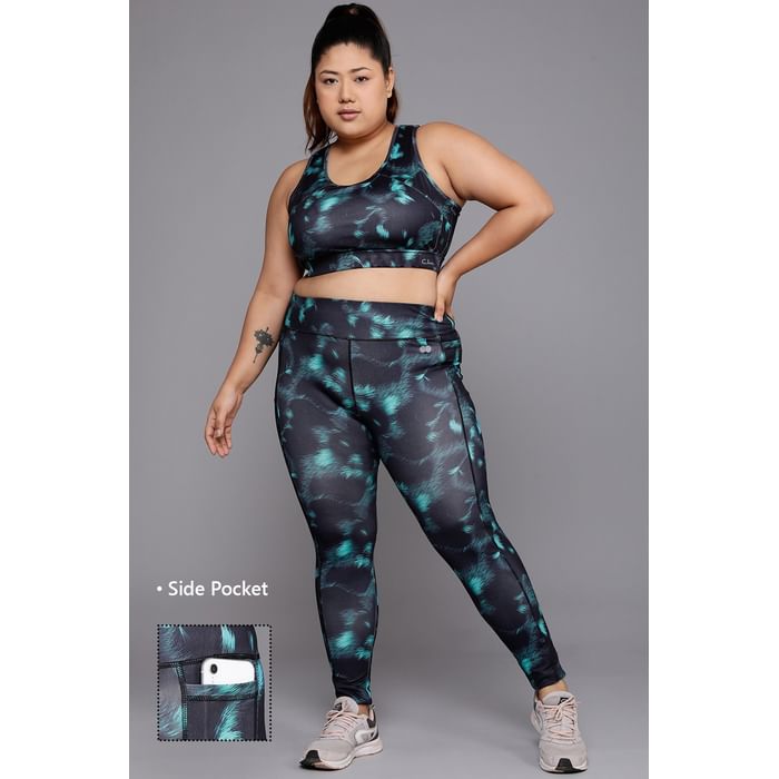 

Clovia Medium Impact Padded Printed Sports Bra & High Rise Active Tights with Side Pocket in Black - ASC041P13