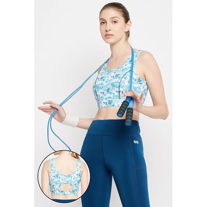 

Clovia Medium Impact Padded Marble Print Sports Bra in Sky Blue - BRS026P03