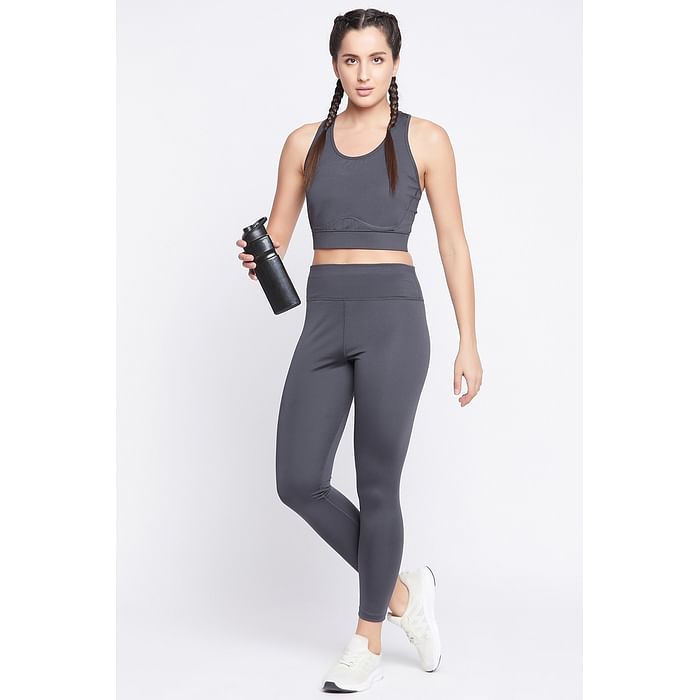 

Clovia Medium Impact Padded Sports Bra & High-Rise Ankle-Length Tights in Dark Grey - ASC076P05