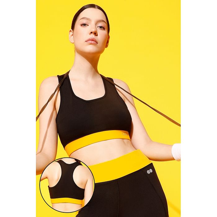 

Clovia Medium Impact Padded Sports Bra with Removable Cups in Black - BR2084E13