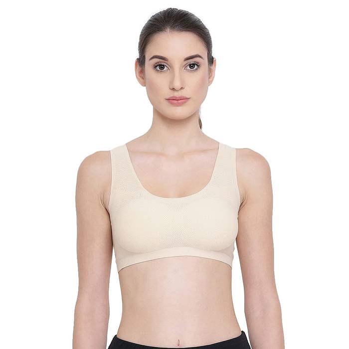 

Clovia Low Impact Padded Sports Bra With Criss-Cross Back in Nude - BR1977P24, Nude-colour