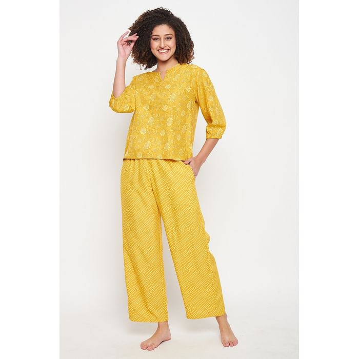 

Clovia Print Me Pretty Peplum Top & Pyjama Set in Yellow - Rayon - LS0729P02, Light yellow