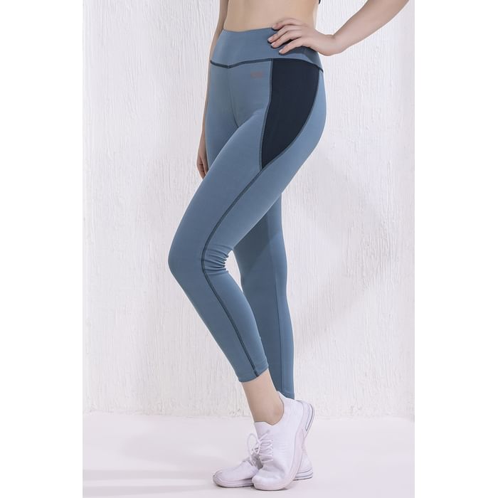 

Clovia Mid-Rise Ankle-Length Active Tights in Baby Blue with Side Pockets - AB0057A03, Light blue