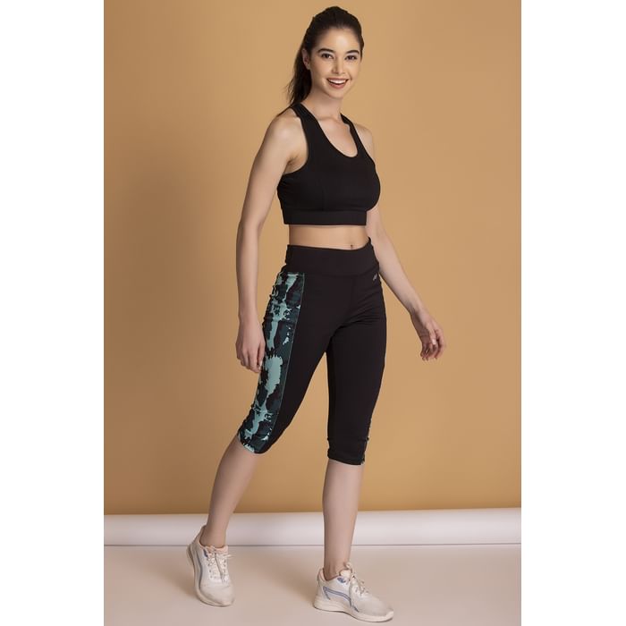 

Clovia Snug Fit High-Rise Active Capri in Black with Printed Panels - AB0094D13