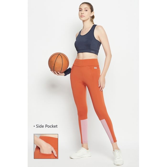 

Clovia High-Rise Active Tights in Orange with Side Pocket - AB0022P16