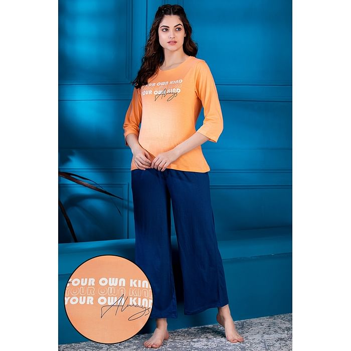 

Clovia Text Print Top & Solid Flared Pyjama Set in Peach Colour - 100% Cotton - LS0546P16, Orange