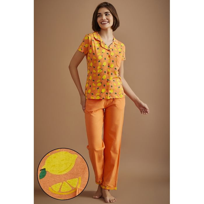 

Clovia Tutti Fruity Button Down Shirt & Chic Basic Pyjama Set in Peach Colour - 100% Cotton - LS0025P34