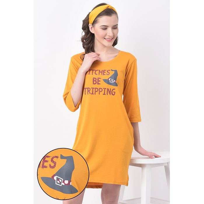 

Clovia Witches Be Tripping Text Print Short Night Dress in Mustard with Knotted Hairband - 100% Cotton - NSC233P07