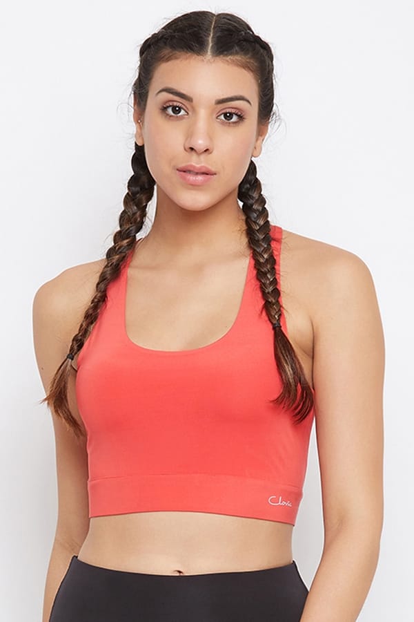 Buy Medium Impact Padded Sports Bra with Racerback Design in Coral Red